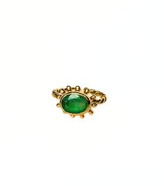 The silver ring with a green beryl and an 18-carat gold coating from Moss Jewellery is an exquisite piece of jewelry that seamlessly blends elegance with the beauty of nature. At the heart of this accessory is a green beryl stone, radiating a mesmerizing sparkle and boasting an intense, deep shade of green. This precious gem symbolizes natural beauty and serves as an emblem of harmony and inner balance. The surrounding silver band delicately frames the beryl, creating a sophisticated contrast and lending the ring an understated yet refined appearance. The 18-carat gold coating, executed with state-of-the-art techniques, adds a touch of luxury and brilliance, elevating the overall elegance of the piece. The design of this ring reflects inspiration drawn from nature, aiming to create unique Cabochon Emerald Ring Gift, Gift Cabochon Emerald Ring, Green Emerald Cabochon Rings, Green Rings With Bezel Setting For May Birthstone, Green Bezel Set Rings For May Birthstone, Green Sapphire Open Ring Fine Jewelry, Green Tsavorite Rings With Bezel Setting, Green Birthstone Ring With Bezel Setting, Green Birthstone Ring With Bezel Setting, Open Design