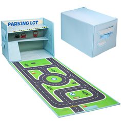 a play set with a parking lot in the middle and a toy car on the other side