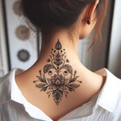 a woman with a tattoo on her neck