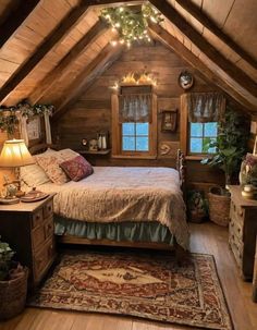 an attic bedroom with wooden walls and ceiling, decorated with christmas lights on the bed