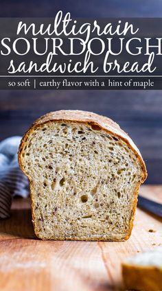 a loaf of sourdough sandwich bread sitting on top of a cutting board