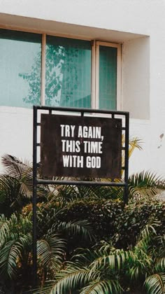 a sign that says try again, try again, try again and try again with god