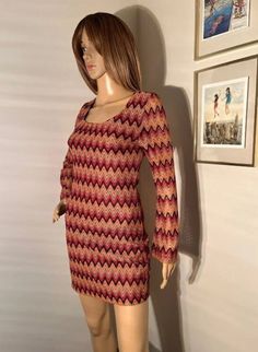 "Vintage 70s bell sleeve chevron dress. Best fits XS/S. Tight on the hips and booty. Very flattering. Waist 14\" Length 24\" Shoulder to shoulder 13.5\" Pit to pit 16.5\" Dress is stretchy For reference, mannequin measurements are as follows: Height: 69\" (5'9\") Chest: 32\" Waist: 24\" Hip: 34\"" Multicolor Stretch Bodycon Dress For Fall, Retro Fitted Mini Dress For Fall, Fitted Retro Mini Dress For Fall, Multicolor Stretch Mini Dress For Fall, Fitted Multicolor Bodycon Dress For Fall, Retro Stretch Dresses For Fall, 70s Inspired Fitted Mini Dress For Party, Fitted 70s Inspired Fall Dresses, 70s Inspired Fitted Fall Dresses