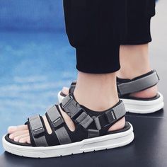 Stay on trend with the Grey Techwear Sandals Platform. These new fashion men's platform sandals are perfect for summer, featuring a casual and breathable design for your beach and outdoor activities. With a light and soft construction, plus a non-slip sole, these shoes are both stylish and practical. Explore our full collection of Techwear Sandals for even more stylish and versatile options. Sandals Platform, Adidas Adilette, Summer Slippers, Men's Sandals, Tech Fleece, Sport Sandals, Waterproof Fabric, Mens Sandals, Womens Slippers