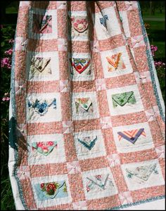 a quilt with many different designs on it