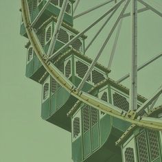 the ferris wheel is green and white in color