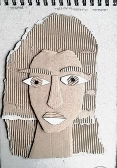 an altered photograph of a woman's face on a piece of cardboard with torn paper