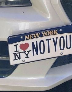 a new york license plate with the words i love ny not you on it's front