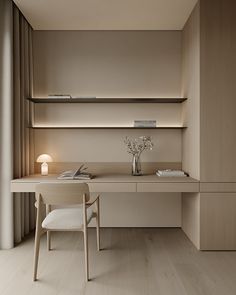 a desk and chair in a room with wooden flooring on the walls, along with shelves