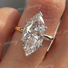 Handmade 5.9 Carat Large Marquise Moissanite Engagement Ring - Big Solitaire Two-Tone - Unique Celebrity Style - Luxury Wedding and Diamond Cocktail Ring → Occasions: Engagement & Wedding DESCRIPTION  -------------------- STYLE                                     :Solitaire  *Moissanite Details  Stone Type                                :Moissanite - High Quality                          Main Stone                            :Marquise  Size (mm)                               :18*9 Carat Weight Marquise Cut Wedding Rings, Marquise Moissanite Engagement Ring, Marquise Solitaire, Marquise Wedding Ring, Pear Moissanite Engagement Ring, Big Engagement Rings, Two Tone Ring, Luxury Engagement Rings, Cute Engagement Rings