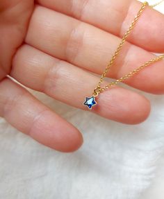 "Lovely gold filled necklace with a blue sapphire star charm. Please choose your favorite necklace length at checkout. Some of this charms are sold by themselves (no chain). If that option is available for this, you will have the option to buy \"CHARM ONLY\" before adding the item to the cart. Normally, a 3 mm ring made out of the same material is attached to the charm. If you own a chain and plan to use the charm for it, ensure that the 3 mm ring will pass through, or you have a bigger ring if Tiny Pendant Necklace, Tiny Pendant, Star Charm Necklace, Tiny Charm, Gold Filled Necklace, Big Rings, Necklace Blue, Star Charms, Star Necklace