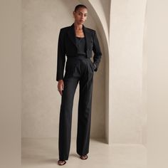 Wandering But Never Astray, The Lavish Heritage Explorer Pant Is Crafted For The Souls That Wish To Roam In Luxury With The Elevated Texture Of Italian Wool. Our Designers Added A Zip Fly, Making It Easier Than Ever To Seize The Day. Relaxed Fit: High Rise. Expertly Cut For A Loose Fit. Straight Leg. Extra Long - So You Can Wear Them With Heels. From Italy's Marzotto Mill: This Style Is Crafted Using 100% Virgin Wool From Italy's Marzotto Mill - One Of The Oldest Mills In Italy, Renowned For Cre Elegant High Waist Black Sets, Elegant High Waist Workwear Sets, Elegant High-waist Workwear Sets, Chic Black Wide Leg Suit, Chic Black Wide-leg Suit, Black Tailored Wide-leg Pantsuit, Black Fitted Wide-leg Pantsuit, Black Fitted Pantsuit With Wide-leg Pants, Tailored Black Ankle-length Pantsuit