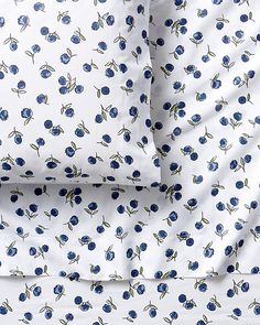 blue flowers on white sheet set with matching pillowcases and duvet covers, made in the usa