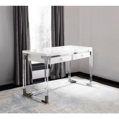 With its contemporary, linear design in white lacquer top and sturdy polished metal and Lucite  base, the contemporary Firenze desk features a sophisticated, well-mannered profile. Two drawers offer plenty of room for storing a laptop, tablet or other essentials. 2 drawers lacqure top & lucite legs, nicle hardware Assamble size W52"xD24"xH30" Drawer inner size  W18xD1.1/2"XL151/2" Cover Lid 4" Burst Strenght 200Lbs polished metal and lucite legs Lucite Desk, Desk Modern Design, High Desk, Contemporary Desk, Office Room Decor, Linear Design, White Desks, Office Furniture Desk, Home Office Design