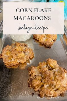 corn flake macaroons recipe on a metal tray with flowers in the background