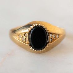 "Product description: Product Type - Ring Metal Type - 925 Sterling Silver (High Quality Polishing & Finishing) Gemstone - Natural Black Onyx Gemstone Size - 8x6 MM Gemstones Shape - Oval Accent Stone - None Gemstone color - As Picture Gemstone Purity - 100% Natural (Guaranteed) Standard Shipping - 3 to 7 Days ($25 Extra) Economy Shipping - 10 to 20 Days (Free Worldwide) Please Note - Color in the picture may be slightly different from the actual product. Due to photographic light conditions 14k Gold Jewelry With Stone Setting For Anniversary, Fine Onyx Jewelry For Anniversary, Black Birthstone Rings For Anniversary, Classic Onyx Rings For Promise, Classic Onyx Promise Ring, Gold Onyx Jewelry For Anniversary, Gold Onyx Jewelry For Anniversaries, Heirloom Yellow Gold Rings With Stone Setting, Heirloom Yellow Gold Ring With Stone Setting