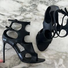 Tom Ford Cut Out Heel In Black Kid Leather Euc Size 8.5 No Box High-end Leather Open Toe Heels, High-end Open Toe Leather Heels, Formal Leather Heels With Open Side Vamp, Luxury Black Open Toe Heels, Black Calf Leather Heels For Formal Occasions, Black Heels With Open Side Vamp For Formal Occasions, Black Calf Leather Heels With 4-inch Heel, Designer Black Heels 4-inch Heel, High-end Black Heels With Round Toe