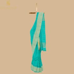 Khinkhwab brings you Maheshwari Sarees. Maheshwari handlooms owe their name to Maharani Ahilyabai Holkar, the ruler of the state of Indore in the late 18th century. Her reign was deemed the Golden Age, and she is revered by all at Maheshwar as Devi Ahilyabai or Ma Saab till date. Maheshwari handlooms derived their fine simplicity from this icon. It is said that under her artistic guidance, the craftspeople made light fabrics, detailed with motifs derived from carvings on the Maheshwar fort- a de Ceremonial Slub Silk Dupatta For Transitional Season, Transitional Cotton Silk Traditional Wear For Rituals, Ceremonial Slub Silk Saree, Cotton Silk Traditional Wear For Rituals, Traditional Green Pre-draped Saree With Border, Green Saree For Rituals And Festive Occasions, Festive Green Saree For Rituals, Ceremonial Slub Silk Dupatta With Pallu, Traditional Slub Silk Wear With Border