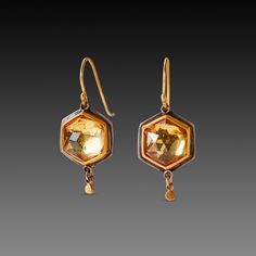 Sparkling rose cut citrine is wrapped in warm 22k gold, and accented with a tiny 22k gold drop. Settings are backed in sterling silver. 18k gold earwires. Settings measure approximately 1/2 inch tall. Earrings hang approximately 1 inch from top of earwire. Matte finish. Gold Octagon Jewelry With Rose Cut Diamonds, Hexagon Rose Cut Diamond Gold Jewelry, Gold Hexagon Rose Cut Diamond Jewelry, Gold Citrine Faceted Earrings, Gold Faceted Citrine Earrings, Gold Citrine Jewelry With Rose Cut Diamonds, Hexagon Earrings, Sparkling Rose, Hand Painted Gifts