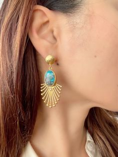 21 ct gold plated brass. Turquoise semi-precious stone earrings length - app 6,0cm 2,7cm Designed by our Turkish designer. Handcrafted with great care. Gold Gemstone Earrings, Turkish Earrings, Luxury Turquoise Cabochon Earrings, Elegant Turquoise Gold-plated Earrings, Artisan Turquoise Beads, Gems, And Cabochons, Ethnic Tibetan Turquoises Earrings, Large Round Turquoise Beads, Gems, And Cabochons, Luxury Handmade Turquoise Beads, Gems, And Cabochons, Earring Stud