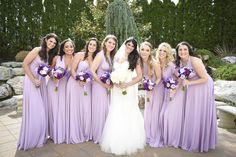 a group of women standing next to each other