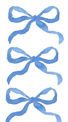 three blue bows on white paper with watercolor paint in the middle and bottom corner