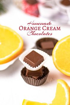 orange cream chocolates with slices of an orange in the background