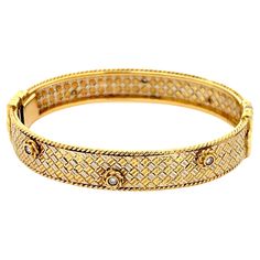 Bracelet Specifications: Metal: 18k White & Yellow Gold Diamond Count: 6 Diamond Color: G Diamond Clarity: VS Diamond Carat Weight: 0.30 Inside Measurements: ~2.25" x 1.86" Bracelet Width: ~ 10.5 mm Total Weight: 27.6 Grams Condition: Vintage, Excellent Stamped: "750" Vintage Bangles, Vs Diamond, Diamond Bangle, Diamond Color, Vintage Bracelets, Diamond Clarity, Colored Diamonds, Gold Diamond, Metallica