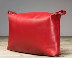 "I have created this pouch based on my needs when I travel, but I'm sure you will find it very useful as well. It is a toiletry bag, but there's nothing to stop you use it as a purse, while at work or while on holiday. It's a beautiful bag! I used a soft leather, pleased at touch, and the interior is lined with a easy to clean fabric. This is it! 23 cm (L) x 16 cm (H) x 6 cm (D) 9\" x 6.3'' x 2.36\"" Leather Zipper Pouch, Leather Bag Women, Leather Hobo Bag, Cosmetic Pouch, Coin Purses, Purse Pouch, Leather Zipper, Leather Hobo, Leather Pouch