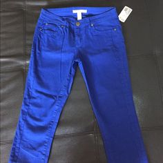 Bright Cobalt Blue Pants. Stretchy Denim Material. Straight Skinny Legs With A Zipper Going Up The Bottom To About Mid Calf. Brand New. Size 26 Blue Cropped Jeans For Fall, Mid-rise Blue Jeggings For Fall, Blue Mid-rise Jeggings For Fall, Blue Stretch Mid-rise Jeans, Fall Blue Mid-rise Jeggings, Blue Mid-rise Jeggings With Pockets, Mid-rise Blue Jeggings With Five Pockets, Blue Stretch Jeggings For Fall, Fall Stretch Blue Jeggings