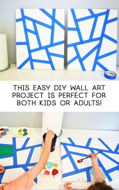 two children are painting on canvass with blue tape and white paper, while another child is