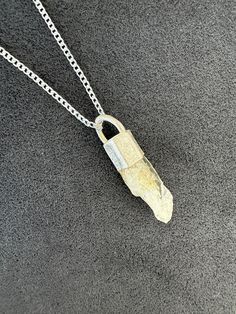 "One of a kind Crystal Pendant mounted on solid 925 Sterling Silver base with hoop.  Pendant height : 1.5\" (including silver base) Pendant width: 0.5\" Base width: 0.5\" Necklace is 925 pure sterling silver 2mm link chain.  Necklace length: 19.5\" Citrine: Semi-precious gemstone Colors: Yellow, orange" Unique Sterling Silver Jewelry With Silver Chain, Untreated Sterling Silver Round Pendant, Untreated Sterling Silver Collectible Jewelry, Sterling Silver Amulet Necklace With Lobster Clasp, Sterling Silver Amulet With Silver Chain, Untreated Sterling Silver Necklaces In Silver, Untreated Sterling Silver Necklaces As Gifts, Silver Sterling Silver Necklace, Untreated Silver Necklace As A Gift