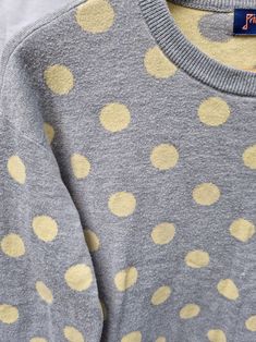 This lovely drop shoulder polka dot sweater has simple yellow spots over a grey background. Please note there is some very light pilling. The brand is by Princess Highway. Please note- measurements are taken from the actual garment and are approximates. Size 10 Measurements- Bust (front underarm to underarm) 50cm Waist (front bottom of ribbing) 44cm Length (top of shoulder to hem) 49.5cm Sleeve length 44cm  Brand- Princess Highway Condition- This item is 2nd hand but in very good condition. There is some slight pilling. Thanks so much for stopping by! Please feel free to message me for any information or questions. Diamond Sweaters, Princess Highway, Polka Dot Sweater, Textured Sweater, Grey Background, Front Bottoms, Button Up Dress, Pullover Sweater Women, Linen Skirt