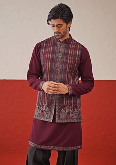 Elevate your wardrobe with Wine Jacket Kurta. Crafted from luxurious georgette, features resham and sequinned embroidery on a closed jacket. Teamed with a yoke design kurta, intricate cuffs, detailed daman, and matching embroidered dupatta and pants. Perfect for special occasions like Sangeet, Mehendi, or as a wedding guest outfit. Composition : Jacket, Kurta, Trouser & Dupatta : Viscose Georgette Care: Dry Clean Only and Vacuum Storage This product can be customized for sleeves, length and colo Kurta Set With Jacket, Design Kurta, Yoke Design, Vacuum Storage, Designer Suits For Men, Indian Wedding Wear, Embroidered Dupatta, Buy Wine, Kurta Designs