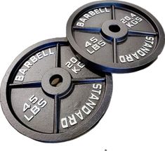 two cast iron weight plates sitting side by side on top of each other with the words barbell 25kg and 40kg