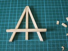 a piece of wood sitting on top of a blue mat