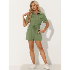 Stay cool and relaxed throughout the day, whether you're running errands or enjoying a summer outing. This jumpsuit is a versatile piece that can be dressed up or down. Pair it with sneakers for a casual daytime look or dress it up with heels and accessories for a night out on the town. The combination of the lapel collar, two pockets, and shorts romper style creates an effortlessly chic and trendy look. Stand out from the crowd and make a fashion statement with this unique jumpsuit. Summer Casual Short Jumpsuits And Rompers, Summer Jumpsuits And Rompers With Pockets, Trendy Jumpsuits And Rompers With Pockets For Beach, Trendy Beach Jumpsuits And Rompers With Pockets, Green Short Sleeve Jumpsuits And Rompers For Summer, Green Jumpsuits With Pockets For Vacation, Green Vacation Jumpsuits With Pockets, Green Jumpsuits And Rompers With Pockets For Vacation, Summer Short Length Jumpsuits And Rompers With Pockets