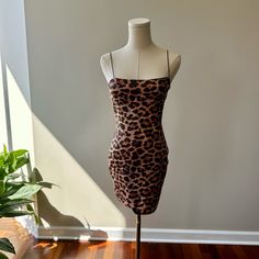 Never Worn With Tags Mini Cheetah Dress. Chic Fitted Tiger Print Dress, Fitted Tiger Print Mini Dress, Fitted Tiger Print Dress For Night Out, Fitted Leopard Print Dress For Date Night, Chic Tiger Print Mini Dress For Party, Leopard Print Mini Dress For Date Night, Tiger Print Mini Dress For Night Out, Tiger Print Mini Dress For Party, Leopard Print Bodycon Dress For Date Night