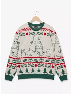 a sweater with totoro and other animals on it