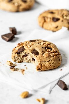 a chocolate chip cookie has been broken in half