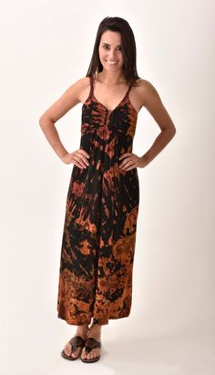 "Our sleek and silky Tie-Dye Maxi Dress adds just the right touch of elegance while keeping things relaxed and easy. Featuring a classic silhouette and soft, stretchy feel, it will soon become your go-to dress for spontaneous warm weather adventures and stress-free travel. One size - Fits sizes 4 -10 52\" length from shoulder Gathered empire waist Braided spaghetti straps Sleeveless Rayon / Spandex Machine washable RAYON SPANDEX BLEND - Luxuriously soft and stretchy, our exclusive blend drapes l Flowy Tie-dye Batik Print Dress, Spring Tie Dye Maxi Dress With Batik Print, Spring Tie Dye Batik Print Maxi Dress, Tie Dye Batik Print Maxi Dress, Tie Dye Batik Print Dress For Festival, Tie Dye Batik Print Festival Dress, Casual Tie Dye Maxi Dress For Festival, Flowy Tie-dye Maxi Dress With Batik Print, Flowy Tie Dye Maxi Dress With Batik Print