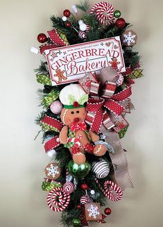 a christmas wreath with a gingerbread baker on it