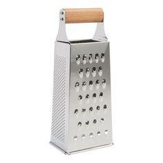 a grater with wooden handle is shown on a white background and it has holes in the side