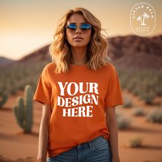 ** INSTANT DOWNLOAD ** This is an image mockup of an Orange Gildan 64000 Crewneck T-Shirt.  This Desert Themed Mock-up has a very aesthetic and casual Outdoor Photoshoot vibe and is a perfect way to showcase all of your Outdoor, Summer, Hiking, Camping, Cowgirl, Western or just anytime of the year tshirt designs. You will receive 1 image - 3000px x 3000px resolution ** HOW IT WORKS ** Once your purchase has been processed through Etsy, you will receive an email from Little Palm Mockups with your Orange Casual T-shirt With Custom Print, Casual Orange T-shirt With Custom Print, Casual Orange Tops With Custom Print, Orange Crew Neck Top With Custom Print, Gildan Tshirt, Summer Hiking, Western Lifestyle, Outdoor Photoshoot, Cowgirl Western