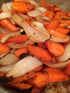 carrots and onions are being cooked together