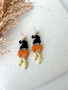 Whimsical Black Earrings For Party, Whimsical Black Party Earrings, Playful Halloween Earrings As A Gift, Fun Halloween Dangle Earrings, Playful Halloween Earrings For Gifts, Playful Halloween Earrings For Gift, Fun Orange Earrings For Halloween, Whimsical Halloween Earrings, Whimsical Black Earrings With Ear Wire