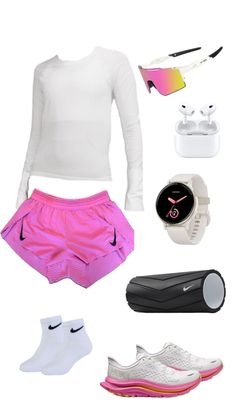 a woman's white shirt, pink shorts and sneakers