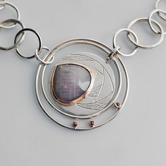 large silver textured round pendant with teardrop rose cut pink gemstone set in rose gold Rose Motif, Metalsmithing Jewelry, Portfolio Ideas, Rose Tone, Rose Necklace, Wrapped Jewelry, Jewellery Designs, Contemporary Jewelry, Art Movement