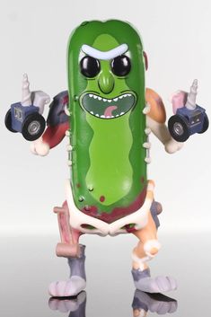 a green toy with wheels on it's back and arms in the shape of a pickle