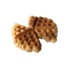 three waffles on a white background with one cut in half and the other whole